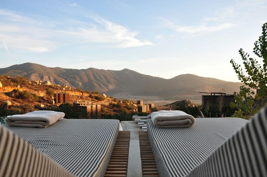 Terrace loungers overlooking the hills at sunset