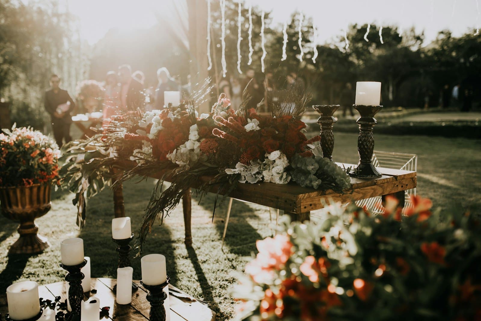 Candlelit outdoor tablescape glowing at golden hour