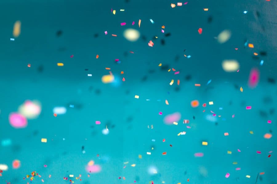 Colourful confetti drifting through the air at a party