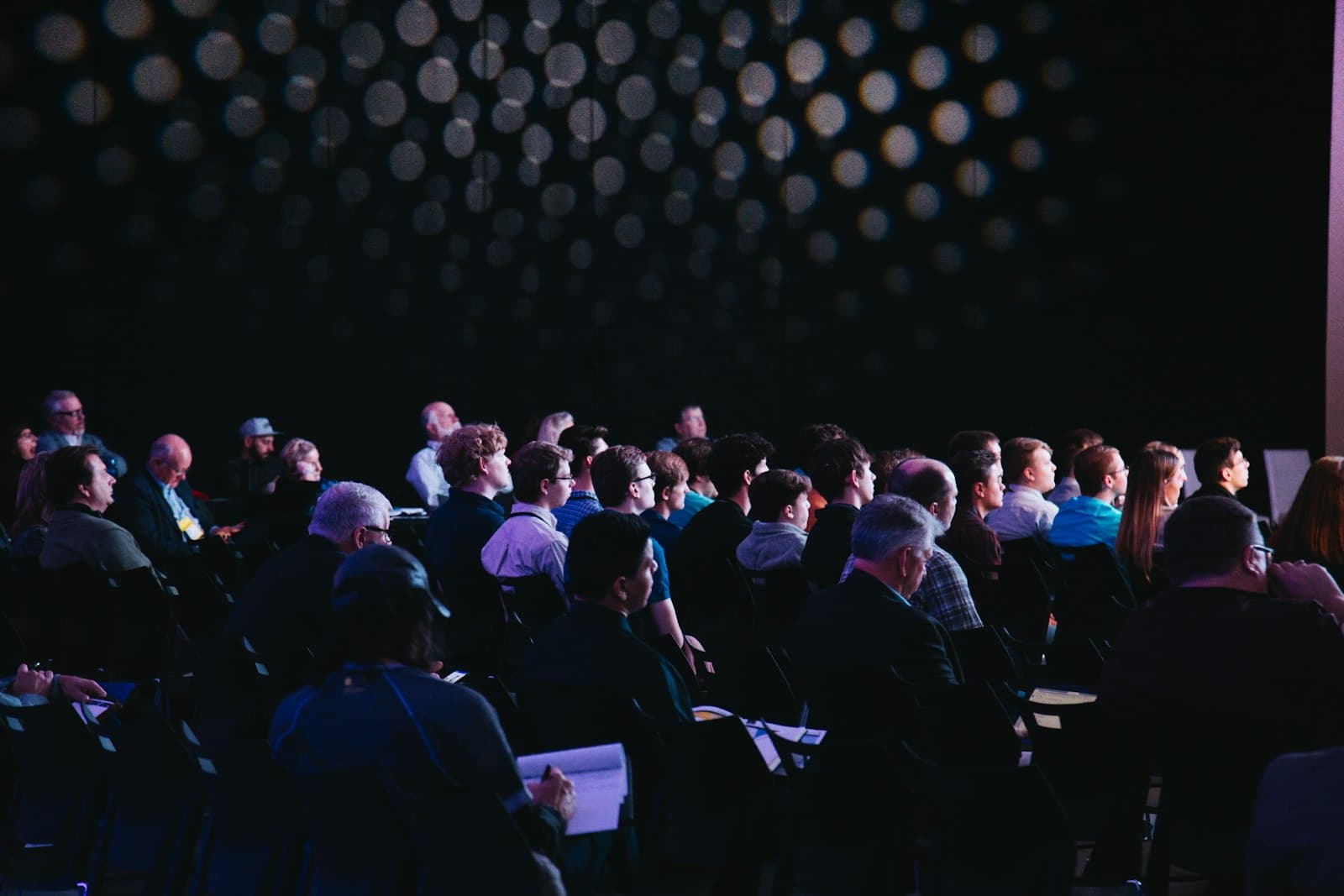 Audience gathered at an evening corporate event